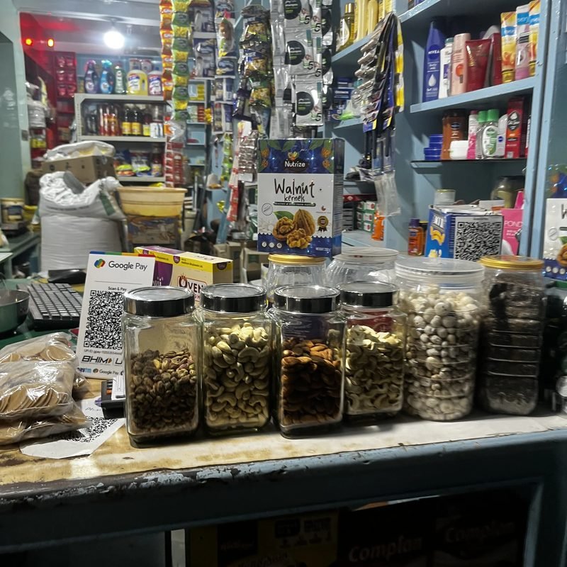 Jars of cashews, almonds, pistachios and other dry fruits.